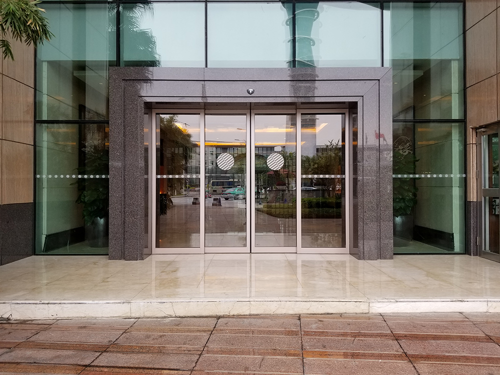 Sleek stainless steel glass balcony door
